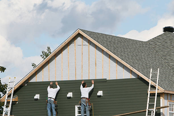 Professional Emergency Siding Repair technician working in Ashley, OH